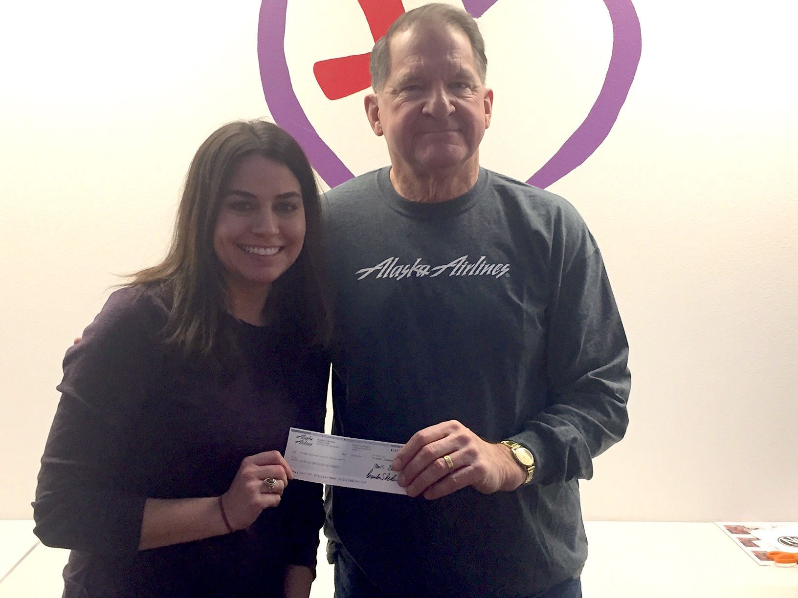 Love INC receives donation from Alaska Airlines board